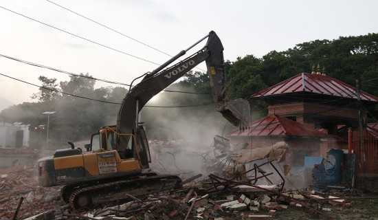 Huts built by encroaching upon land being demolished at Tilganga Pashupati Area