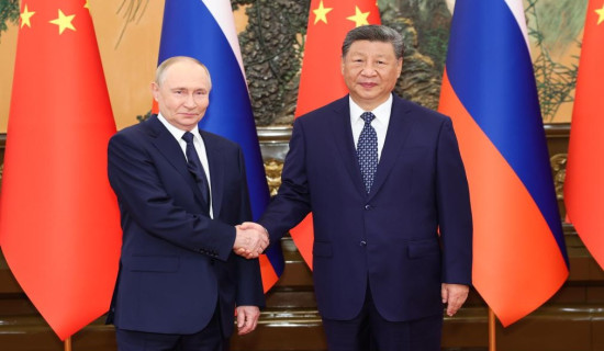Xi holds talks with Putin in Beijing