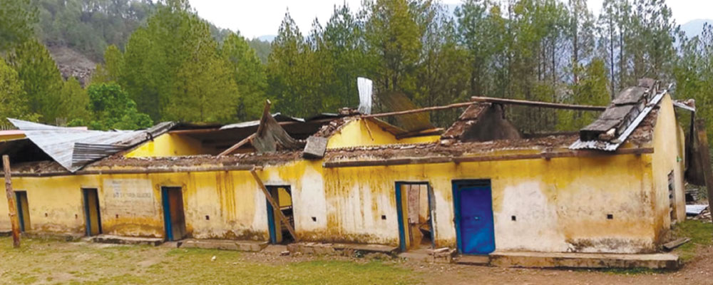 Storm damages school building,  classes held in open sky