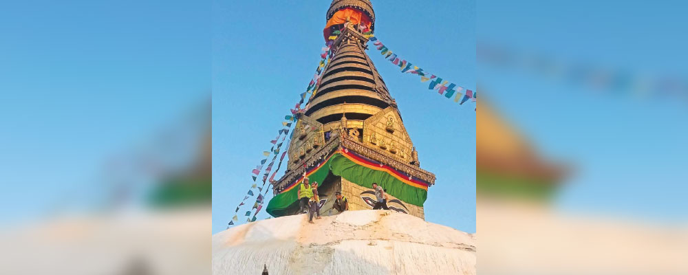 Works underway to remove thick layer of lime on dome of Swayambhunath Stupa