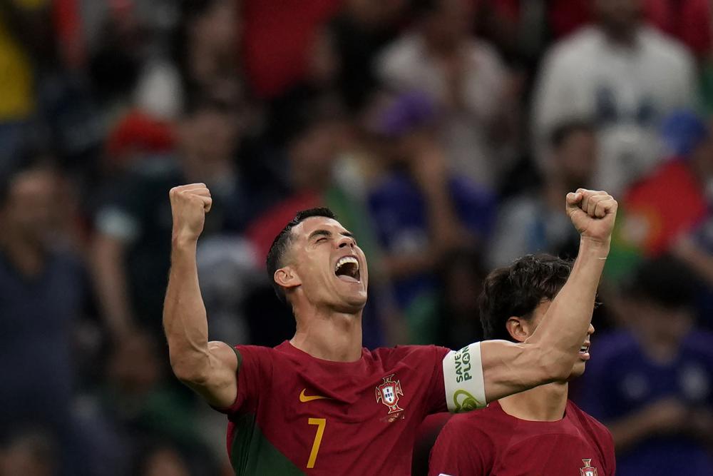 Ronaldo of Brazil celebrates after scoring opening goal during the