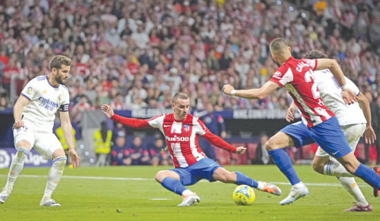 Atletico edge past weakened Madrid