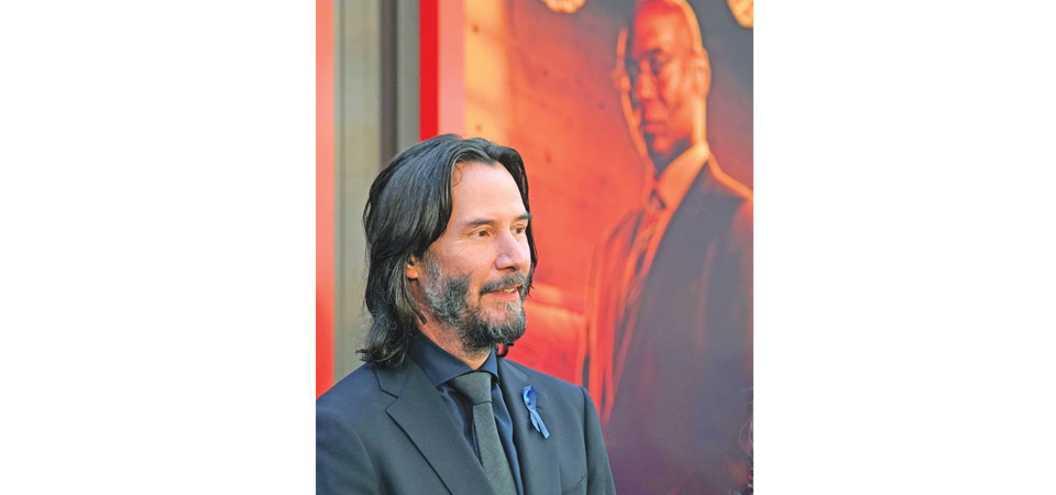 Keanu Reeves honors Lance Reddick at 'John Wick: Chapter 4' premiere