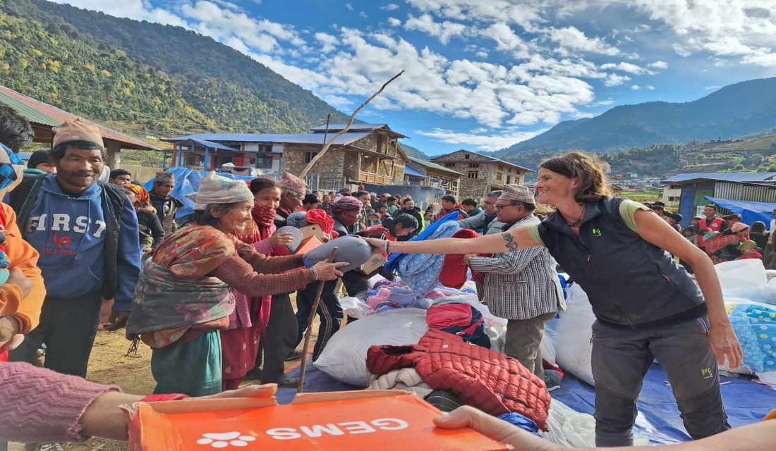 Swiss social activist Moix distributes relief materials to quake-victims in Jajarkot