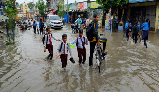 Going to school through inundated road