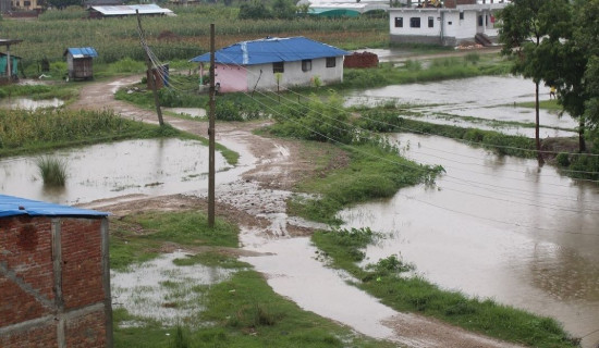 Going to school through inundated road