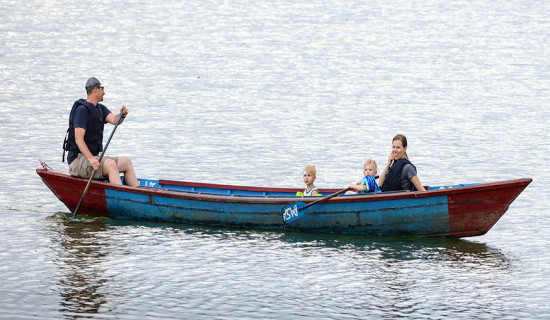 Foreign tourists enjoying boating at Fewa Lake