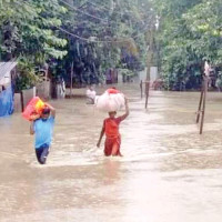 Two missing after being swept away by floods