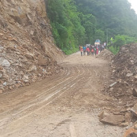 Loader driver injured  while clearing landslide debris