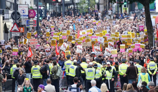 Thousands of counter-protesters rally after riots