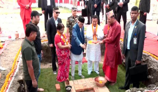 PM Oli lays foundation stone of party central office building