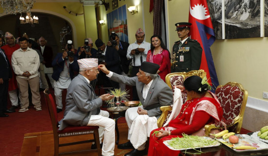 President offers tika and jamara to PM Oli among distinguished persons