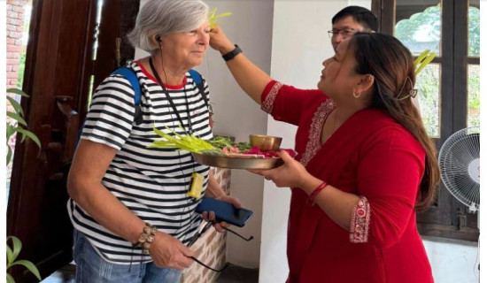 Tourists elated to receive Dashain tika in Bandipur