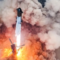 SpaceX catches Starship rocket booster for first time ever as it returns to Earth after launch