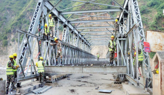 Bailey bridge construction at  final stage in Khurkot