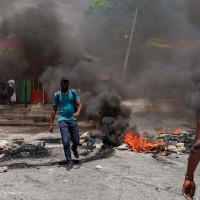 Two killed, 5,000 flee as Haiti gangs attack in Port-au-Prince