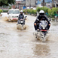 Nine killed as passenger bus falls into river