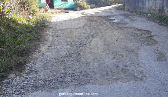 Potholes-ridden road of district headquarter Tamghas