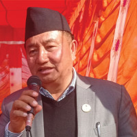 Oli presents political report at party meet