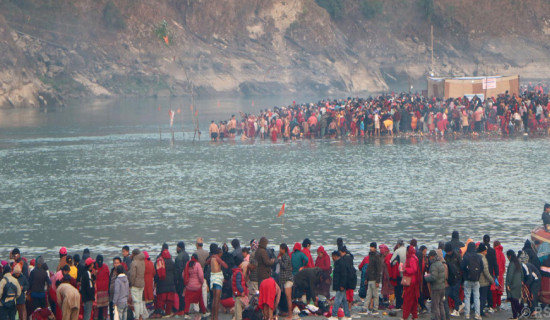 Devotees throng Devghat to take holy bath