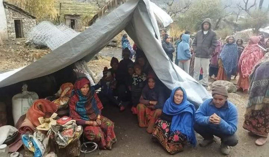 Earthquake victims moves into a cracked house to escape cold