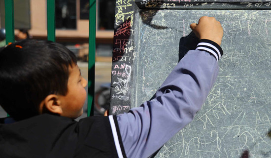 Children start writing on Basanta Panchami (Photo feature)