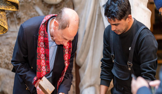 Prince Edward tries his hand at wood carving in Bhaktapur