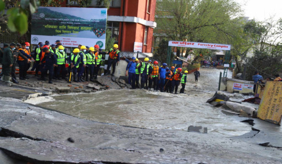 Water spills in Babarmahal due to pipeline damage (Photo Features)