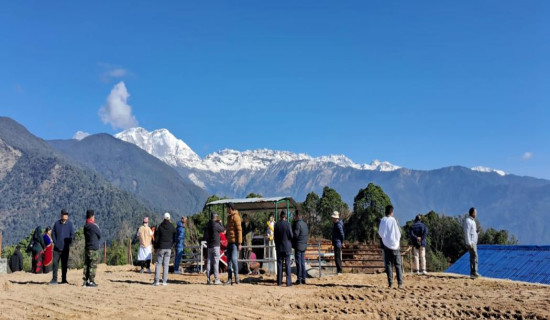 Tourists observing mountain ranges