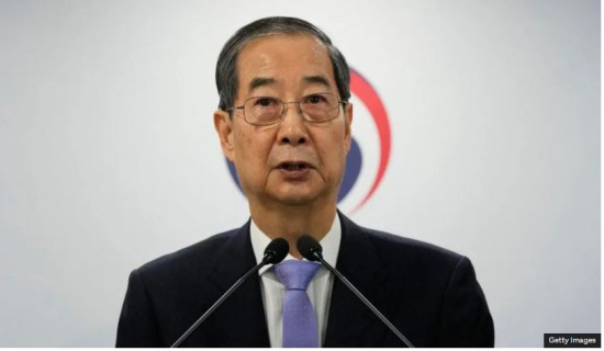 South Korea court reinstates PM as acting leader