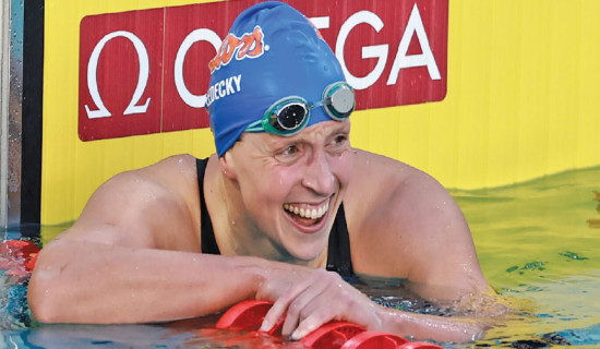 Ledecky, Walsh smash world records