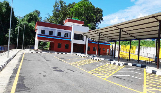 Vehicles parked on roads in Kushma , leaving bus park unused