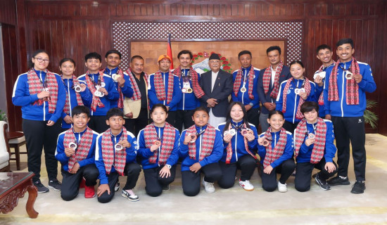 PM Oli congratulates table tennis players