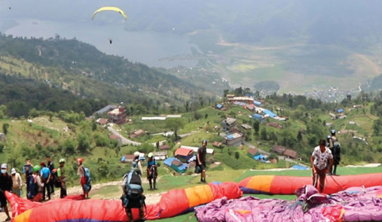Paragliding landings resume at Fewa Lake shore