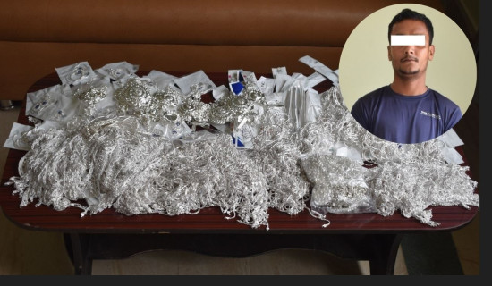One held with  12 kg of silver