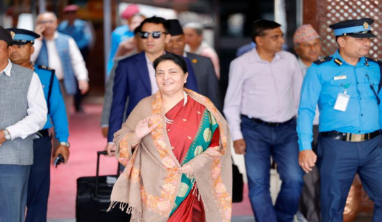 Former President Bhandari returns home from China