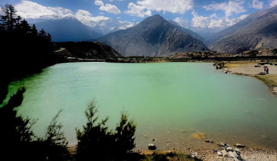 A view of Dhumba Lake at the foot of the Nilgiri Mountains