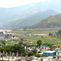 Farmers ploughing field in Dang