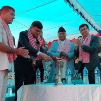 PM Oli distributes computers to 15 community schools