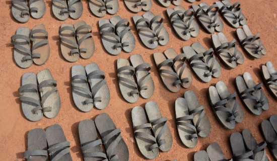 Artisans offer cheap footwear made from rubber tires