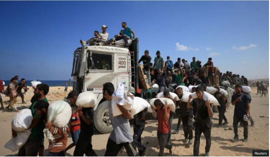 Israeli forces kill 67 Palestinians seeking aid in northern Gaza, Hamas-run ministry says