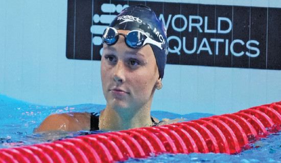 McIntosh wins first gold medal at worlds in her quest for five