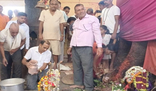 Farmers pray at Dhanush Temple  to appease rain god