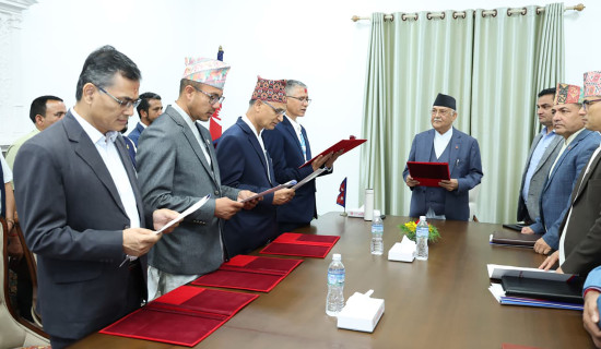 Four newly appointed VCs take oath before PM Oli