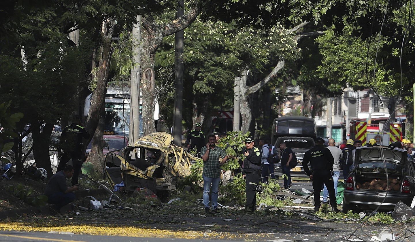 Car bomb and attack on helicopter in Colombia kill at least 17, including police officers