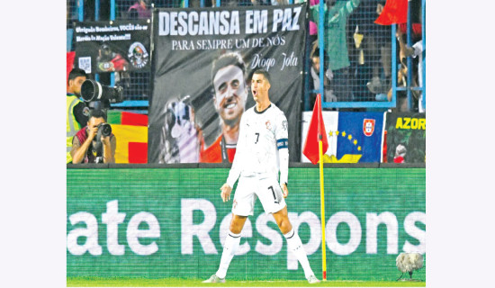 Poignant Portugal cruise, England unbeaten in World Cup qualifying