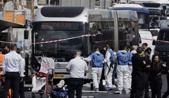 Palestinian gunmen kill 6 at Jerusalem bus stop