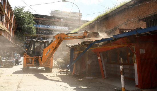KMC begins demolishing structures built illegally