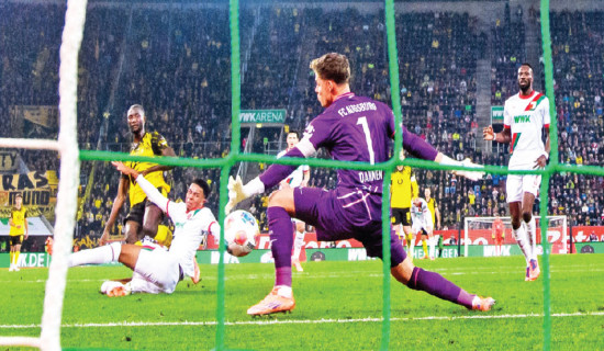 Dortmund beat Augsburg, into second in Bundesliga