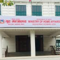 Prince Edward tries his hand at wood carving in Bhaktapur